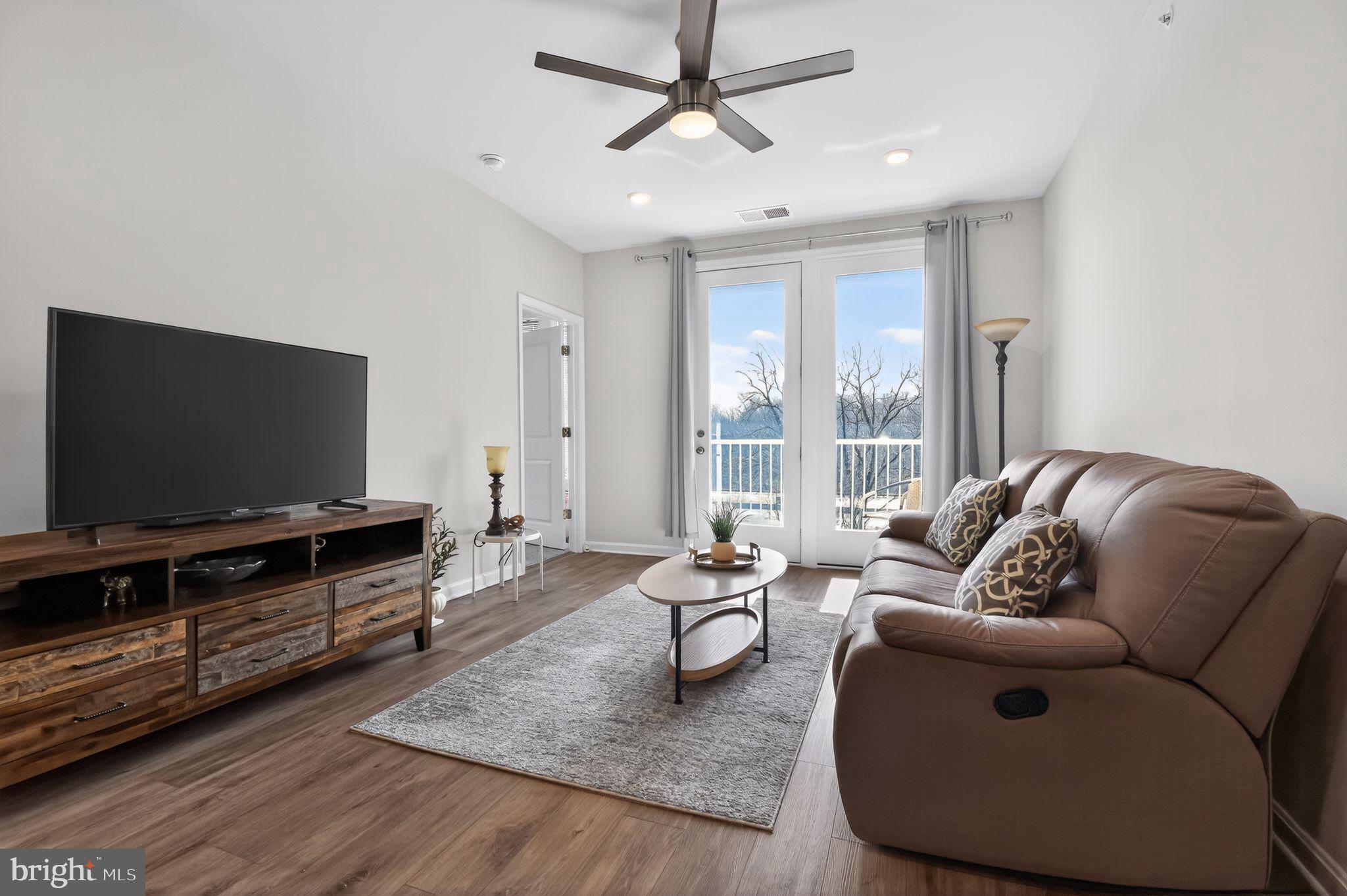 4007 Seaside Alder Road, Unit 8407 Bowie, MD 20720 - Photo 9 of 32 Living Room