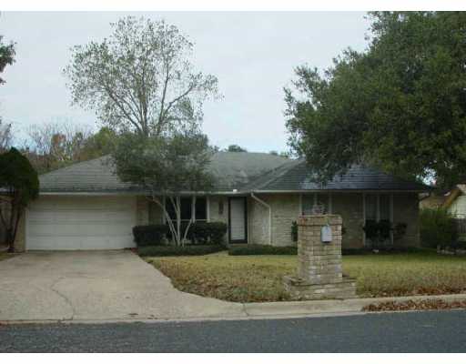 11606 Buckingham Road Austin, TX 78759 - Photo 1 of 1 a front view of a house with garden