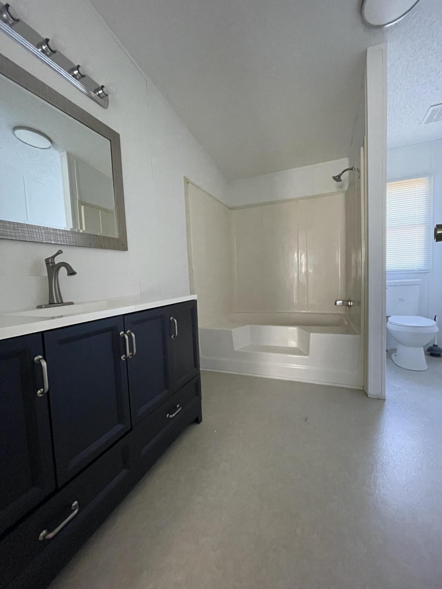 2894 Riverview Road Roanoke, VA 24014 - Photo 4 of 15 a bathroom with a sink and a mirror