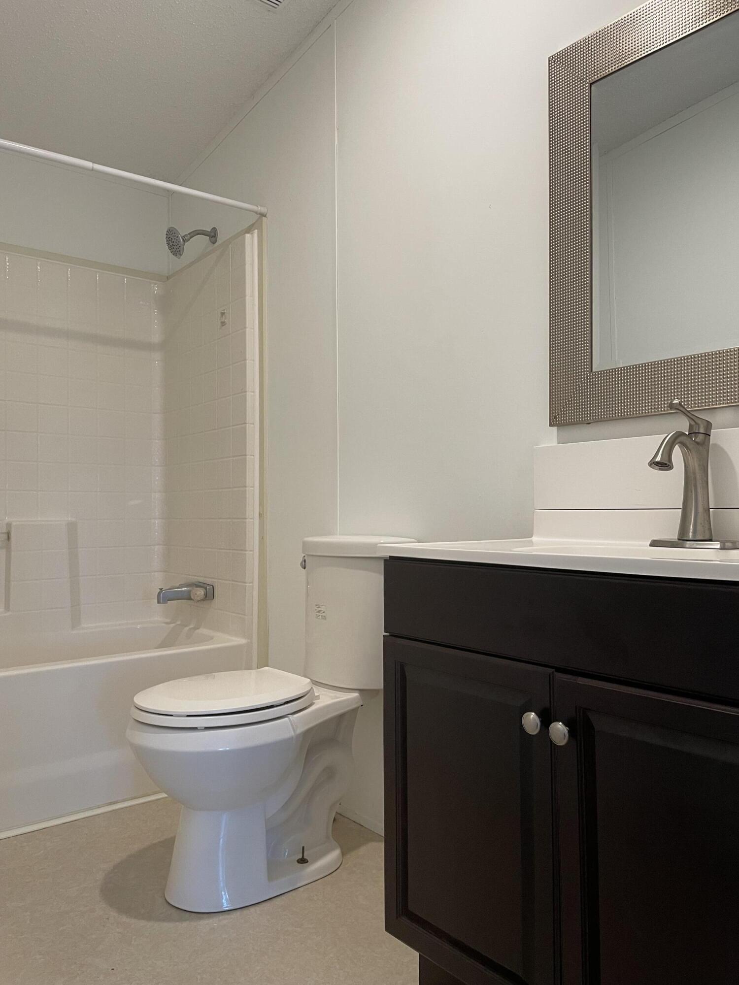 2894 Riverview Road Roanoke, VA 24014 - Photo 10 of 15 a bathroom with a sink toilet and shower