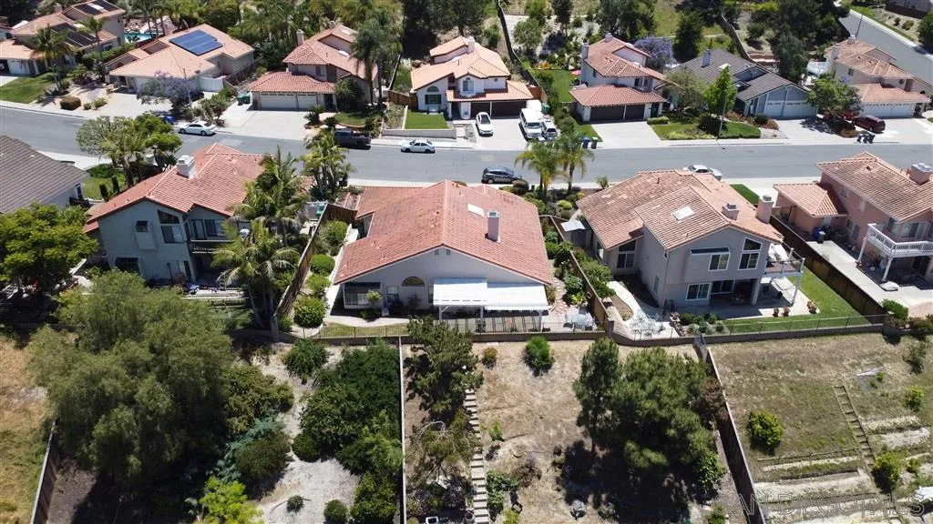 5034 Frazee Road Oceanside, CA 92057 - Photo 25 of 25 an aerial view of residential houses with outdoor space and street view