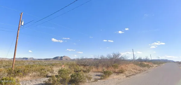 a view of mountain view with mountains in the background