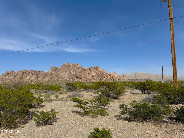 a view of mountains and valleys