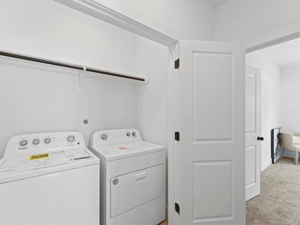 1448 Dewalt Street Houston, TX 77088 - Photo 15 of 24 a view of storage and utility room with washer and dryer