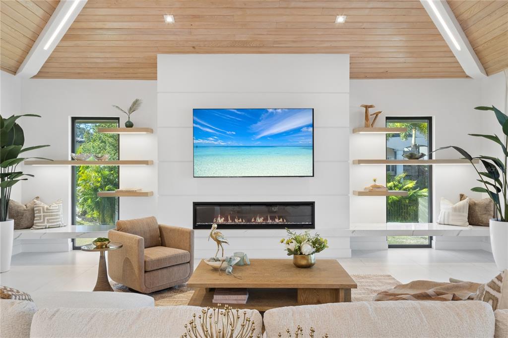 1808 Flower Drive Sarasota, FL 34239 - Photo 16 of 56 a living room with furniture and a fireplace