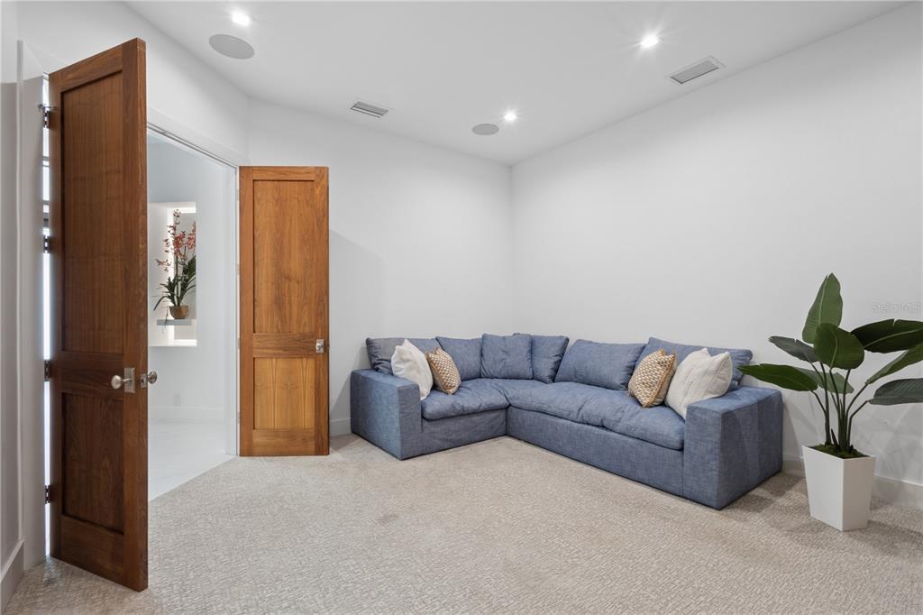 1808 Flower Drive Sarasota, FL 34239 - Photo 40 of 56 a living room with furniture and a potted plant