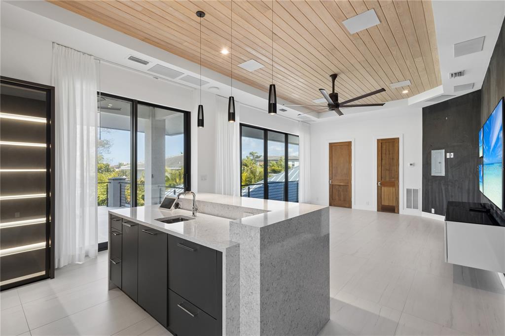 1808 Flower Drive Sarasota, FL 34239 - Photo 45 of 56 a large white kitchen with a large window