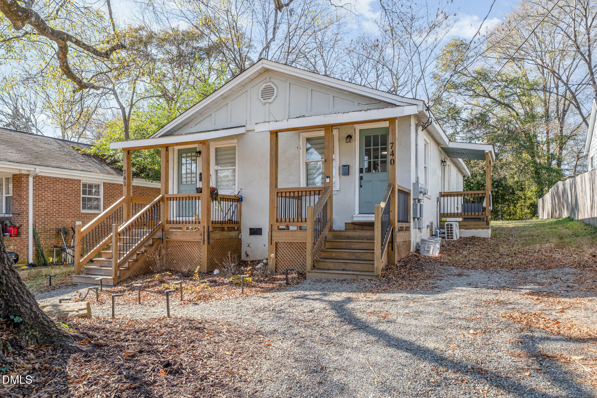740 Quarry Street Raleigh, NC 27601 - Photo 2 of 29 a view of a house with a yard and wooden fence