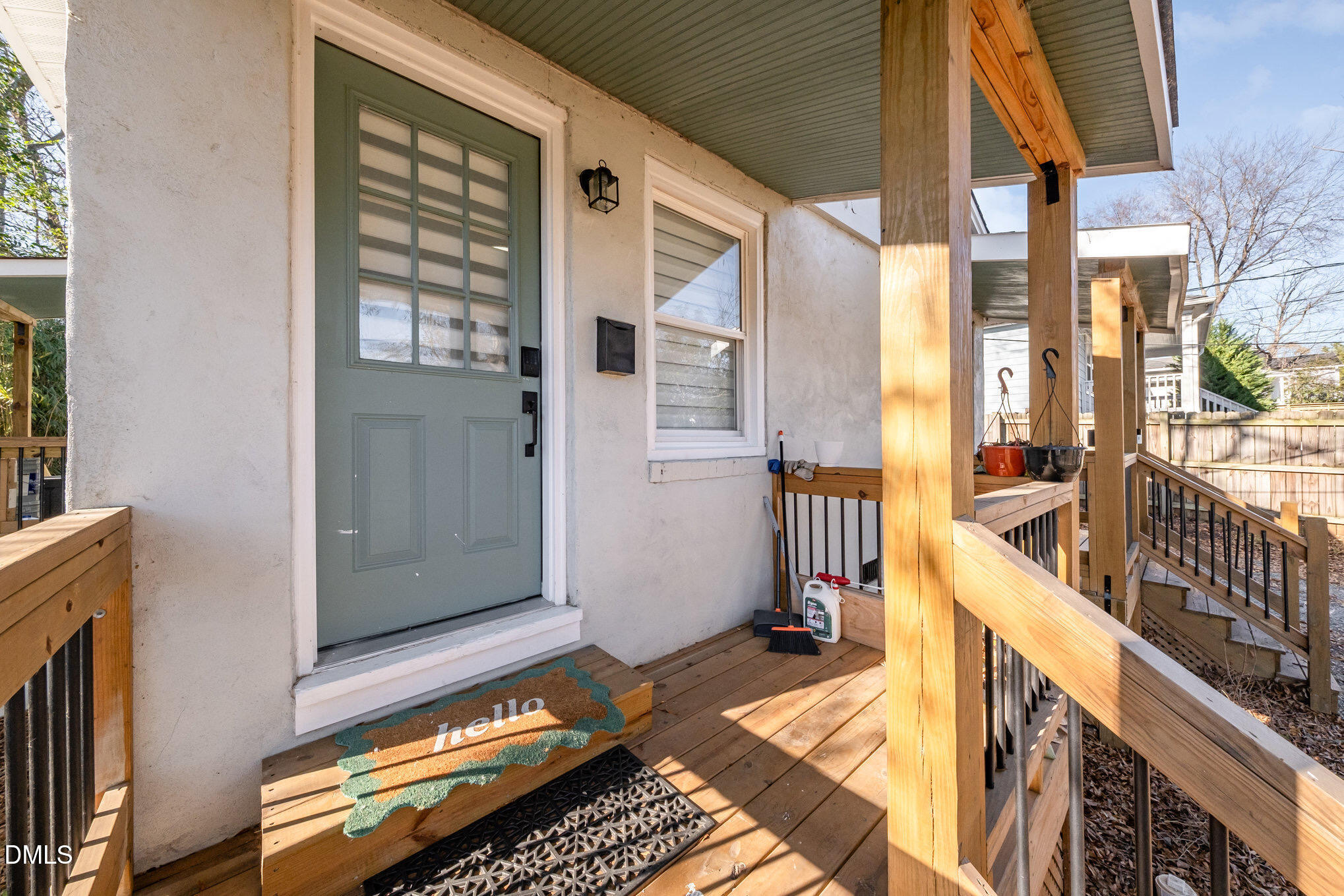 740 Quarry Street Raleigh, NC 27601 - Photo 5 of 29 a view of a balcony with wooden floor and furniture