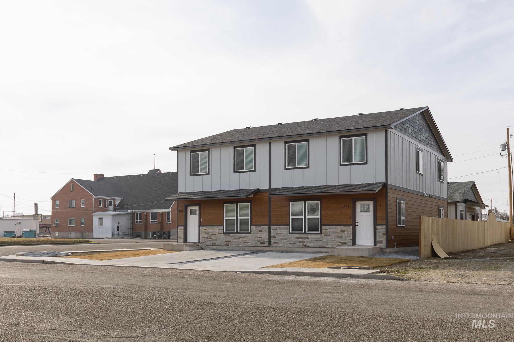 297 Southwest 6th Street, Unit 2 Ontario, OR 97914 - Photo 32 of 37 Traditional home with stone siding, board and batten siding, and a shingled roof