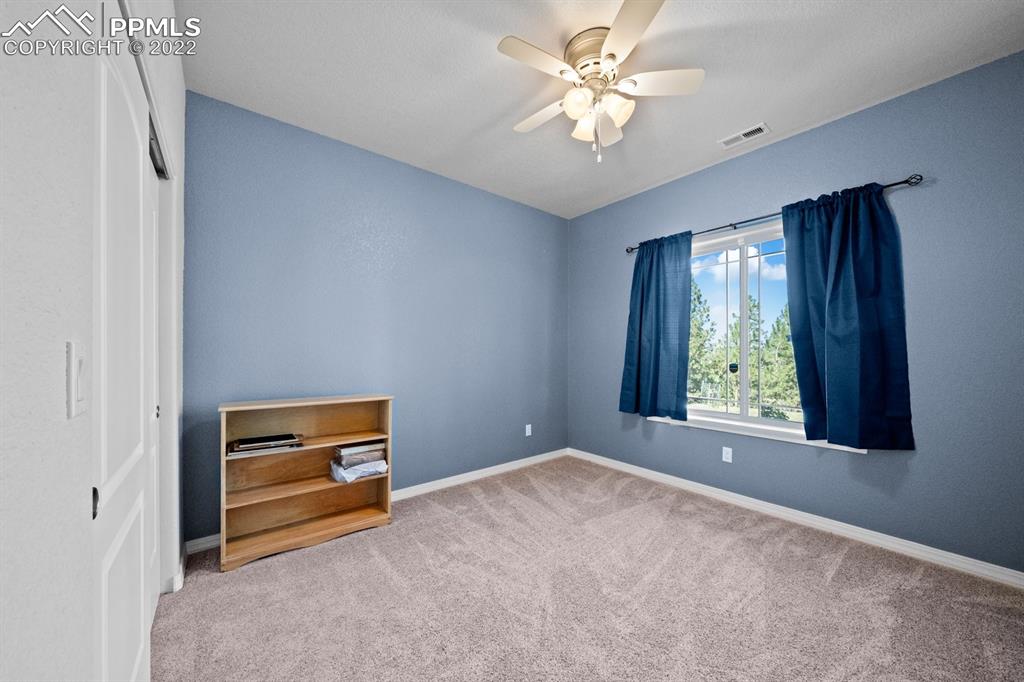 20765 Warriors Path Drive Peyton, CO 80831 - Photo 39 of 50 a view of an empty room with a window
