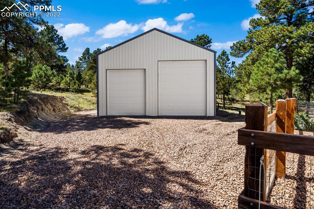 20765 Warriors Path Drive Peyton, CO 80831 - Photo 4 of 50 a view of a house with a yard