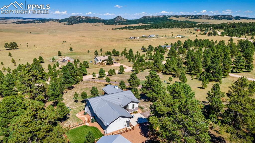 20765 Warriors Path Drive Peyton, CO 80831 - Photo 49 of 50 a view of a city with an ocean view