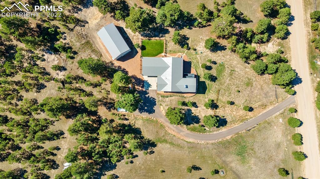 20765 Warriors Path Drive Peyton, CO 80831 - Photo 50 of 50 an aerial view of a house with a swimming pool