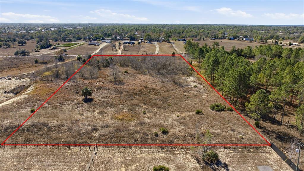 Sweet Gum Road Brooksville, FL 34613 - Photo 5 of 14 a view of a town with mountains in the background