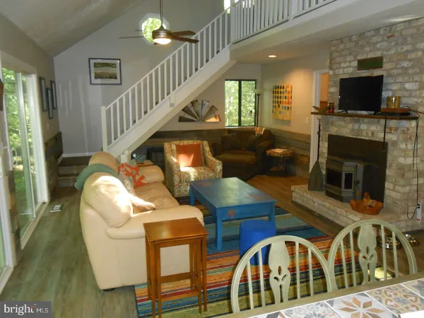 a view of living room furniture and a flat screen tv