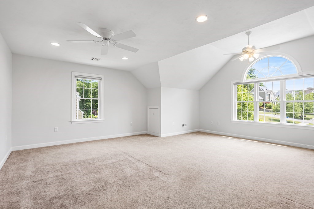 28 Brogden Road Ashland, MA 01721 - Photo 15 of 39 an empty room with windows and fan