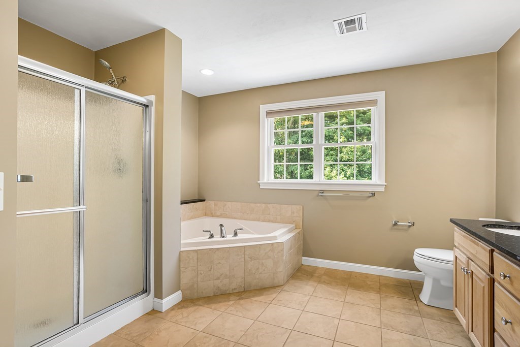28 Brogden Road Ashland, MA 01721 - Photo 19 of 39 a bathroom with a bathtub sink and toilet