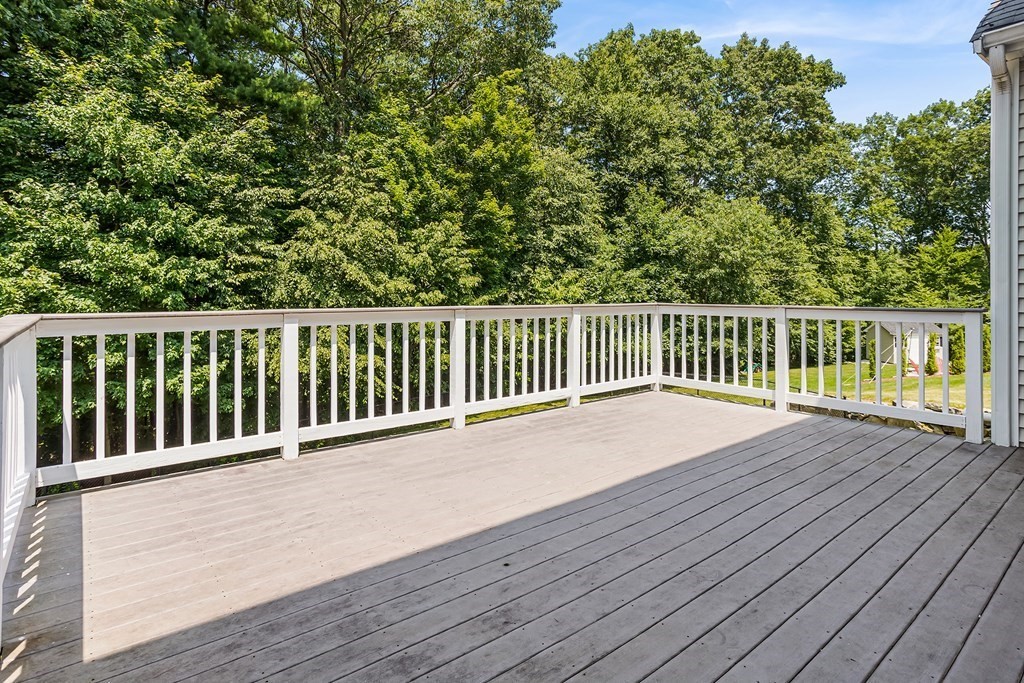 28 Brogden Road Ashland, MA 01721 - Photo 32 of 39 a balcony with wooden floor