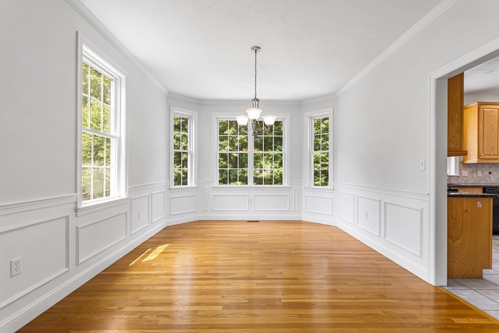 28 Brogden Road Ashland, MA 01721 - Photo 10 of 39 a view of an empty room with window and wooden floor