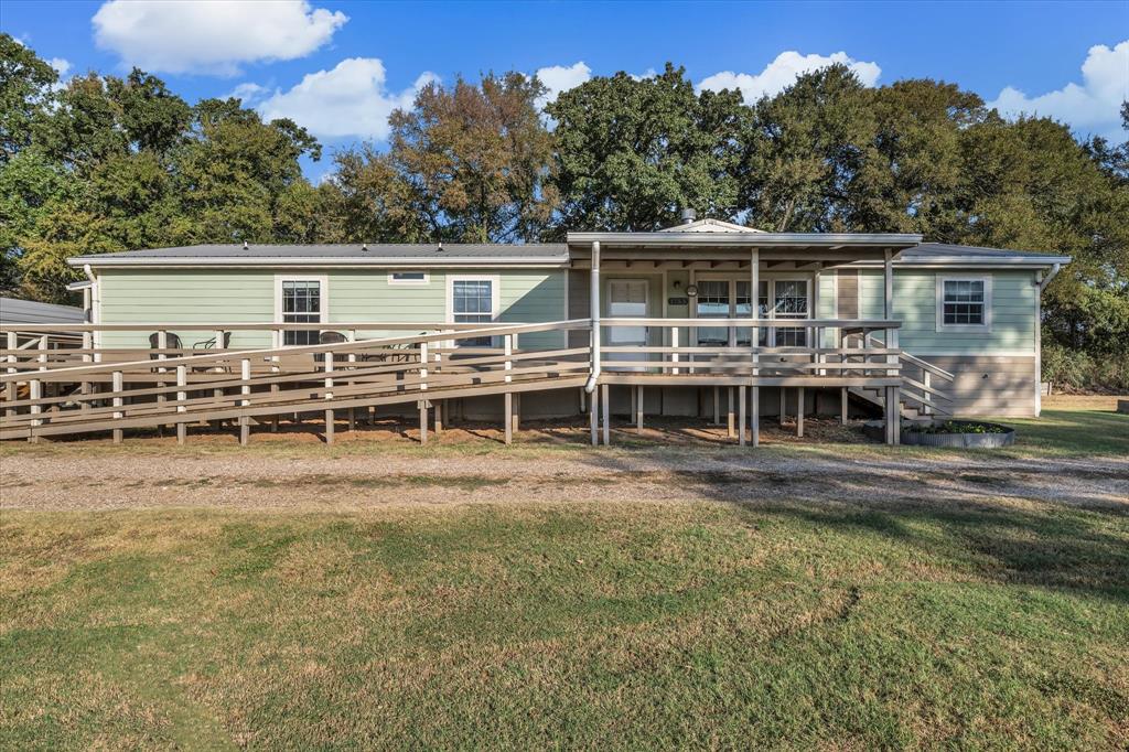 1745 Meixner Road Waco, TX 76705 - Photo 11 of 40 aerial view of a house with swimming pool next to a yard