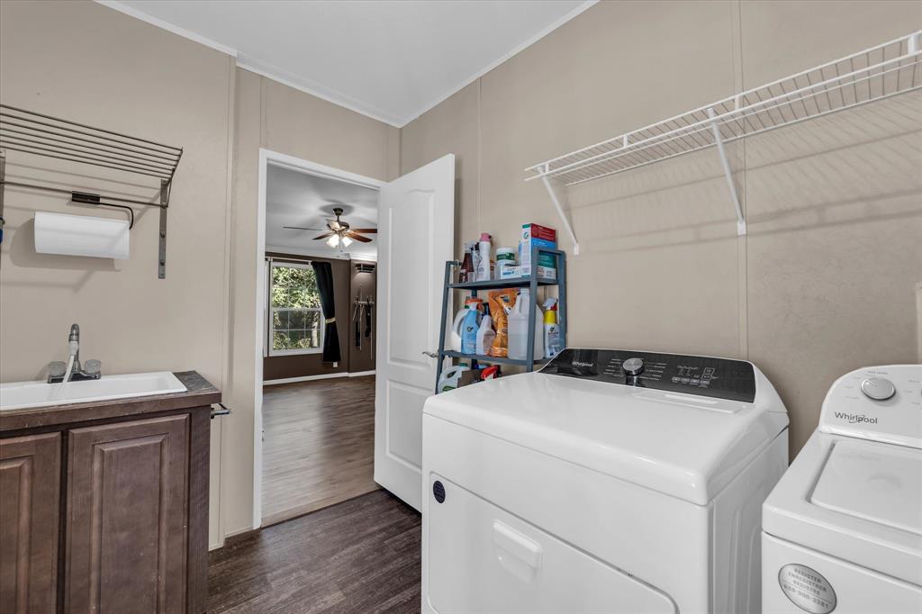 1745 Meixner Road Waco, TX 76705 - Photo 19 of 40 a utility room with dryer and washer