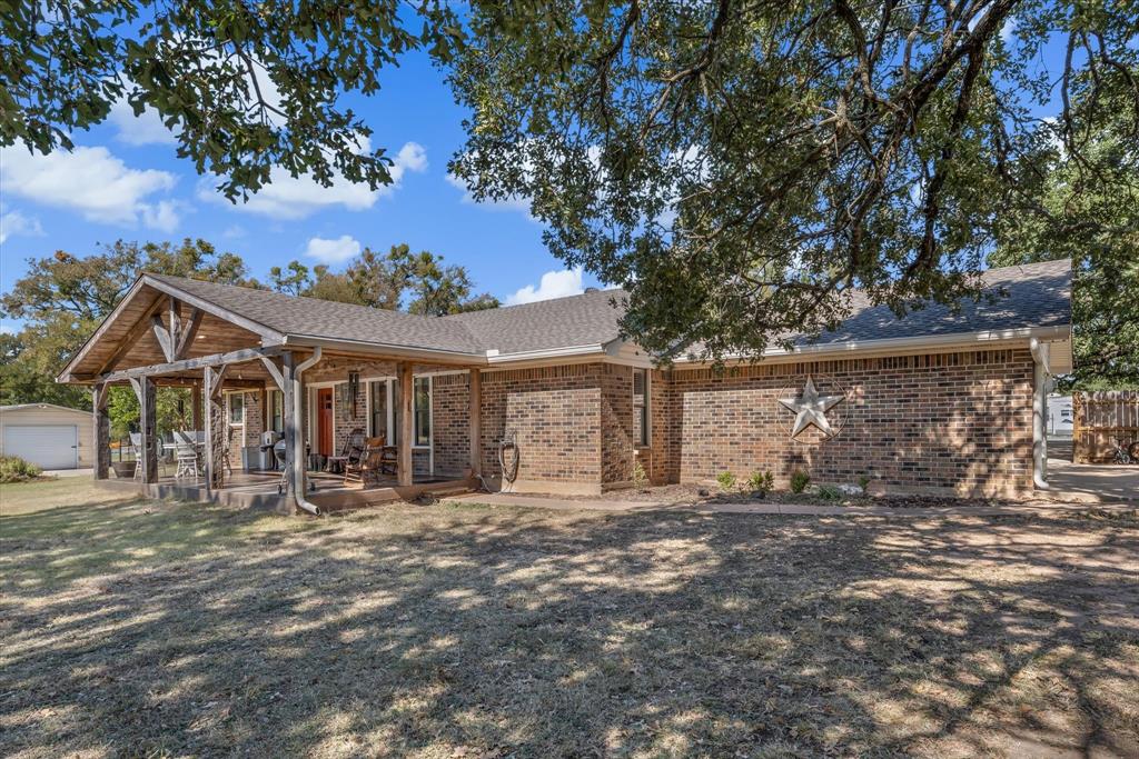 1745 Meixner Road Waco, TX 76705 - Photo 2 of 40 a front view of a house with a yard