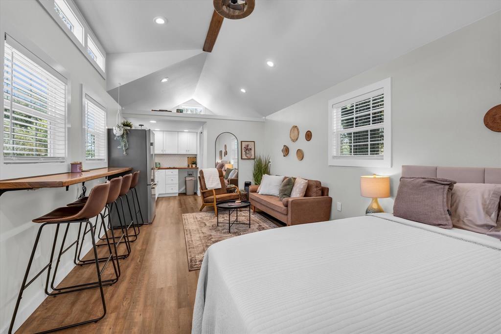 1745 Meixner Road Waco, TX 76705 - Photo 25 of 40 a bedroom with furniture and a large window