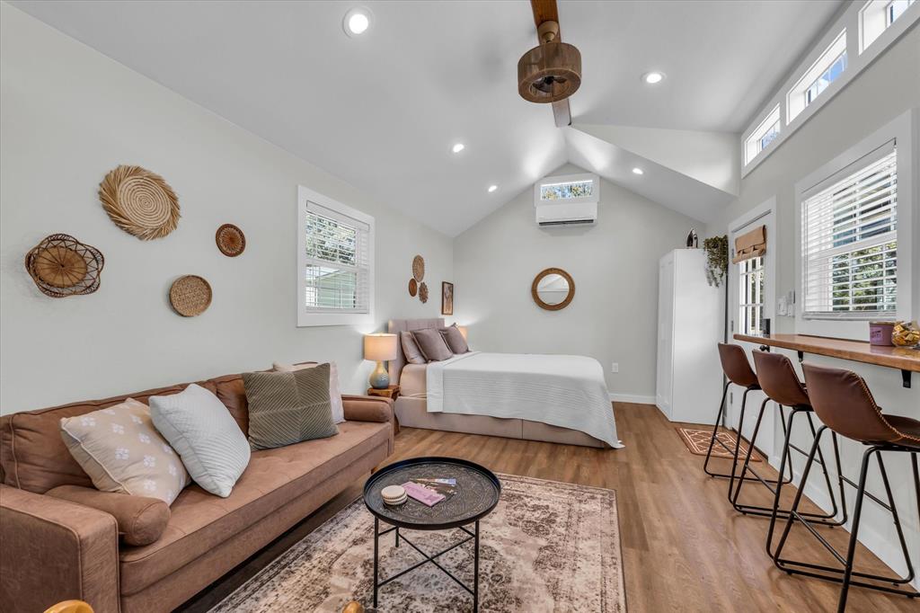 1745 Meixner Road Waco, TX 76705 - Photo 26 of 40 a living room with furniture and a large window
