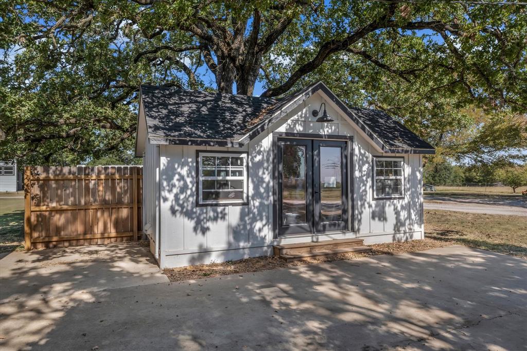 1745 Meixner Road Waco, TX 76705 - Photo 3 of 40 a front view of a house with a tree