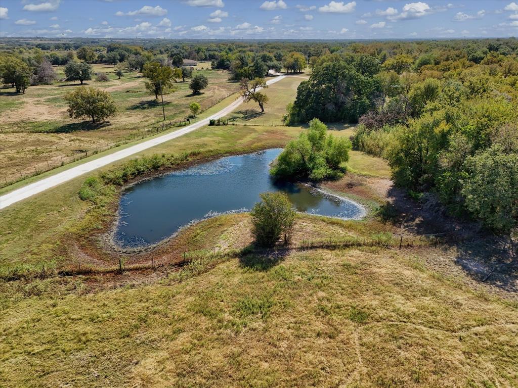 1745 Meixner Road Waco, TX 76705 - Photo 35 of 40 a view of a swimming pool with a yard