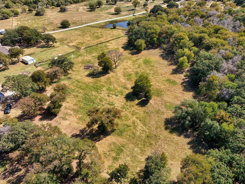 1745 Meixner Road Waco, TX 76705 - Photo 37 of 40 a view of a yard covered with snow