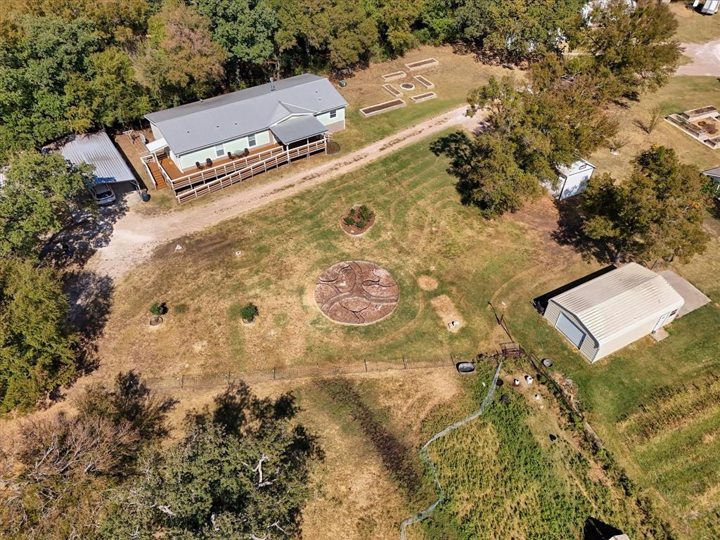 1745 Meixner Road Waco, TX 76705 - Photo 38 of 40 an aerial view of residential house with pool and trees all around