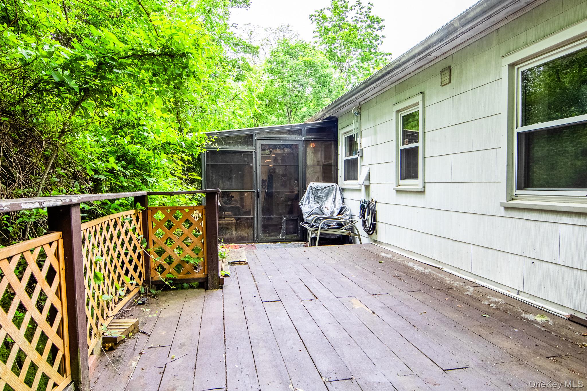 36 Rochambeau Road Garrison, NY 10524 - Photo 35 of 39 Back deck off the sunroom