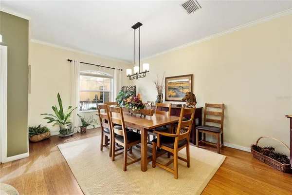 a view of a dining room with furniture