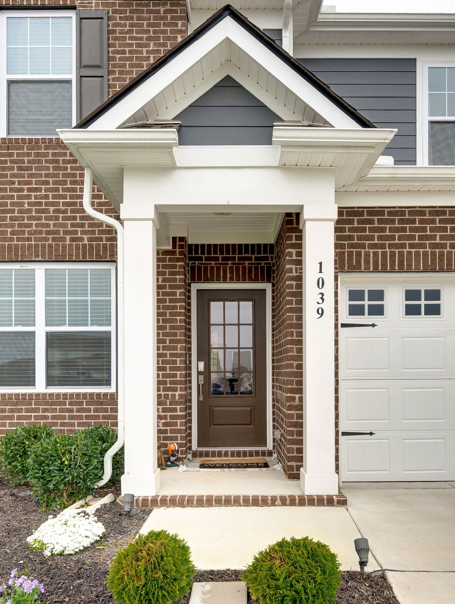 1039 Ewell Farm Drive Spring Hill, TN 37174 - Photo 11 of 70 a front view of a house with a yard