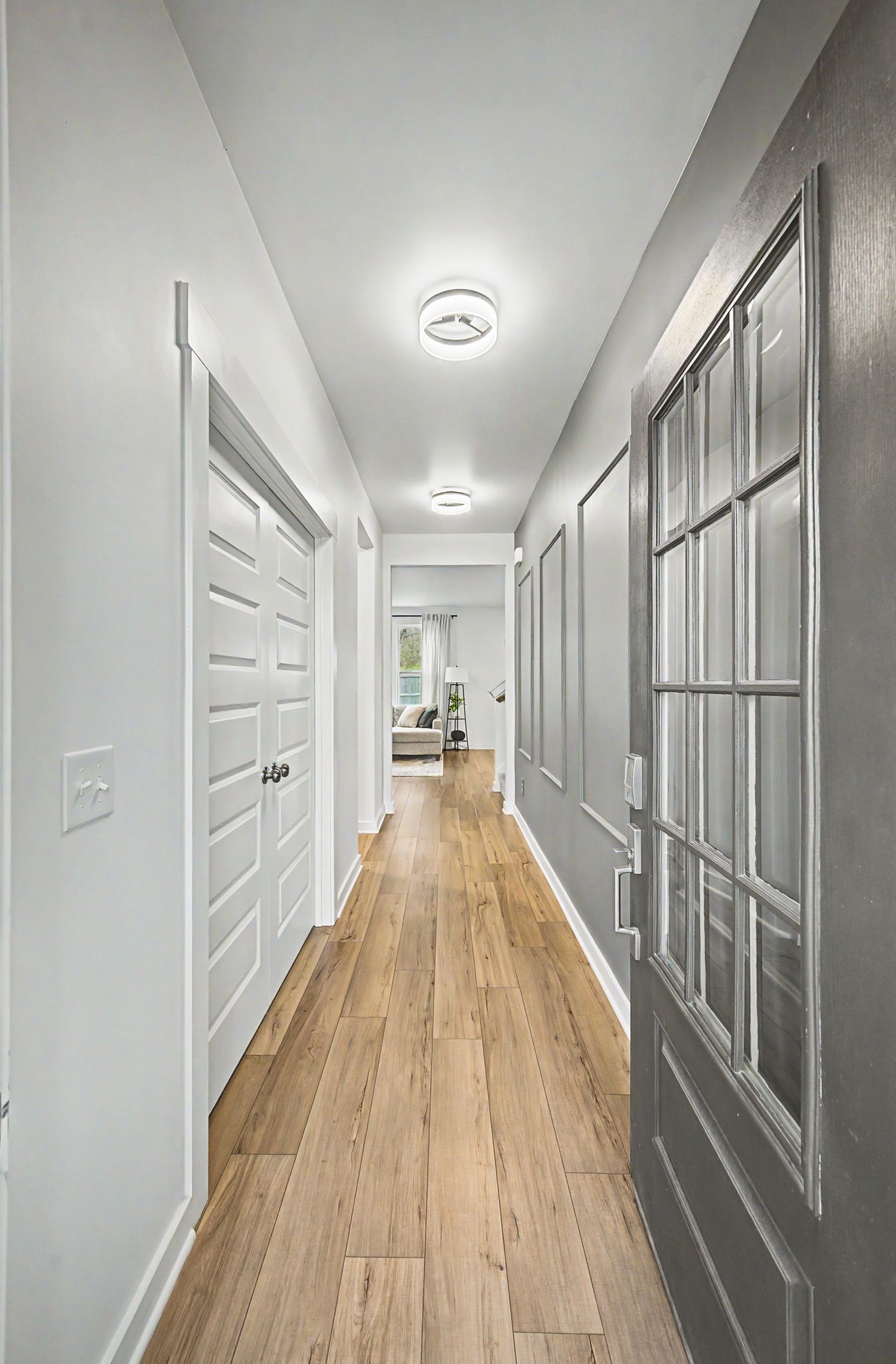 1039 Ewell Farm Drive Spring Hill, TN 37174 - Photo 12 of 70 a view of a hallway with wooden floor and a bathroom