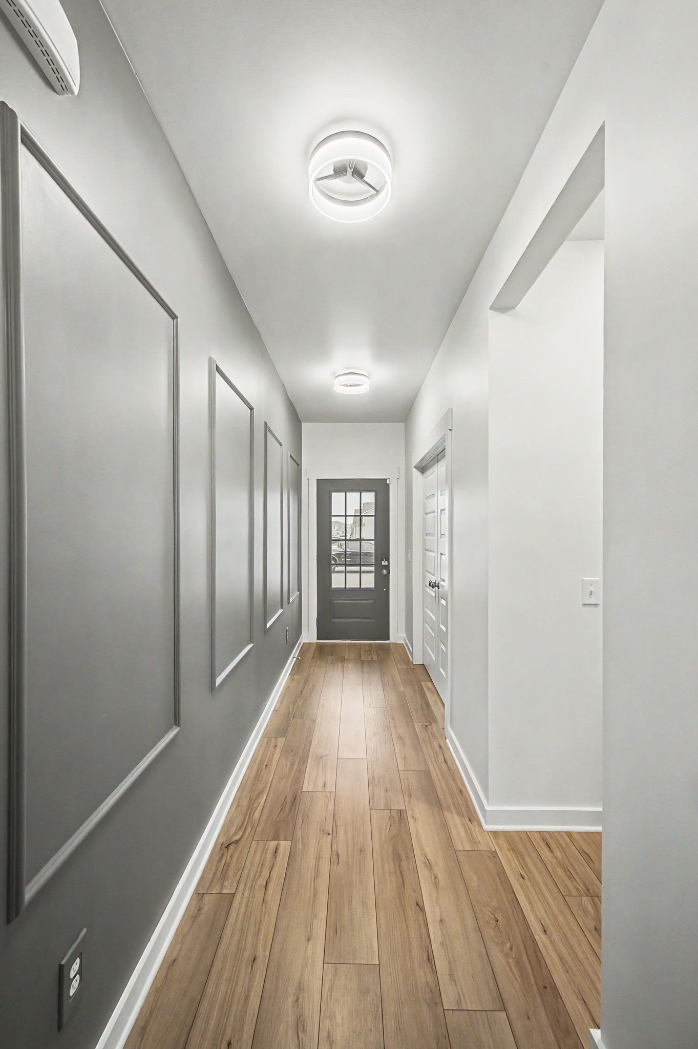 1039 Ewell Farm Drive Spring Hill, TN 37174 - Photo 13 of 70 a view of a hallway with wooden floor