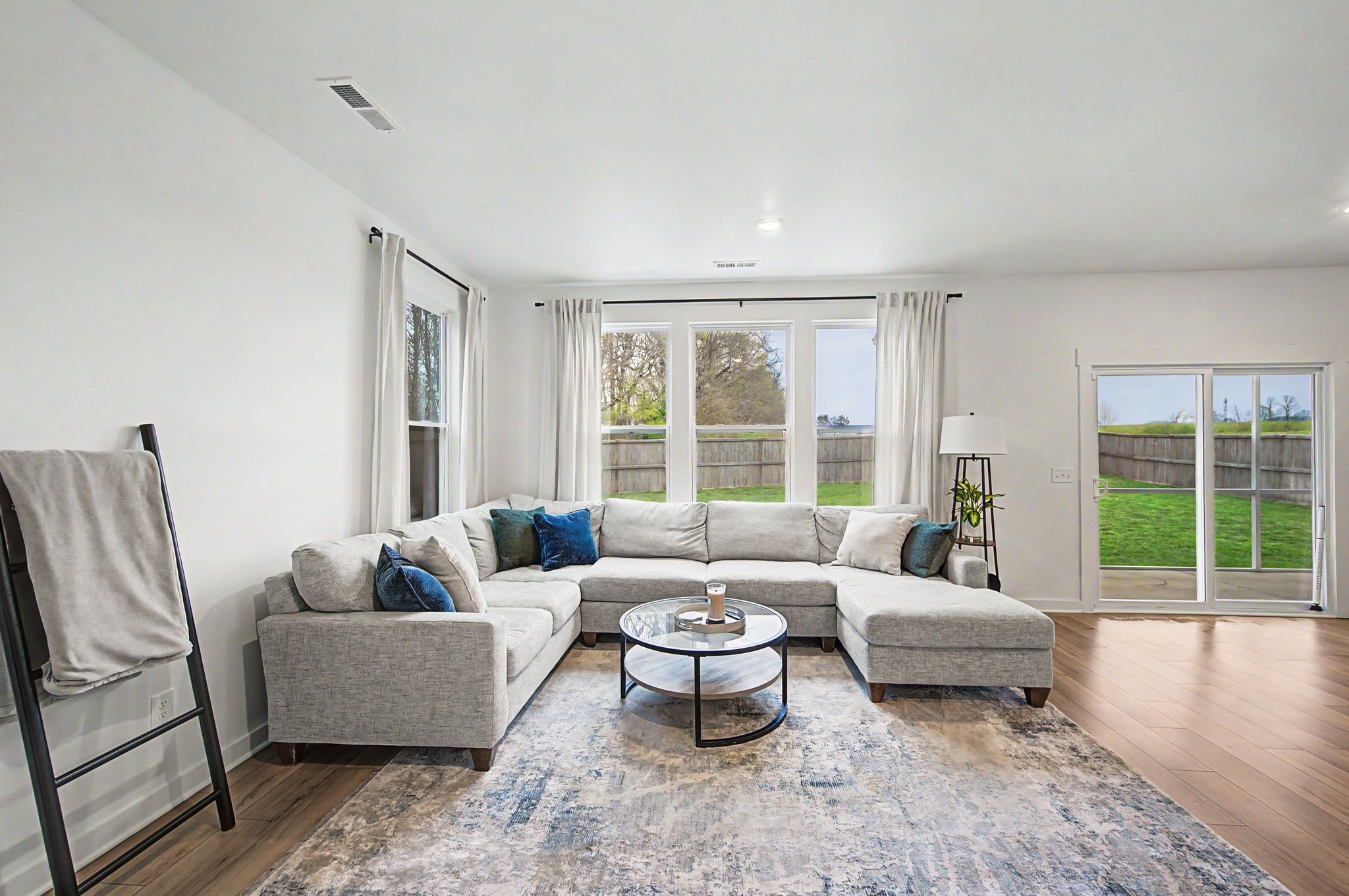 1039 Ewell Farm Drive Spring Hill, TN 37174 - Photo 18 of 70 a living room with furniture and a large window