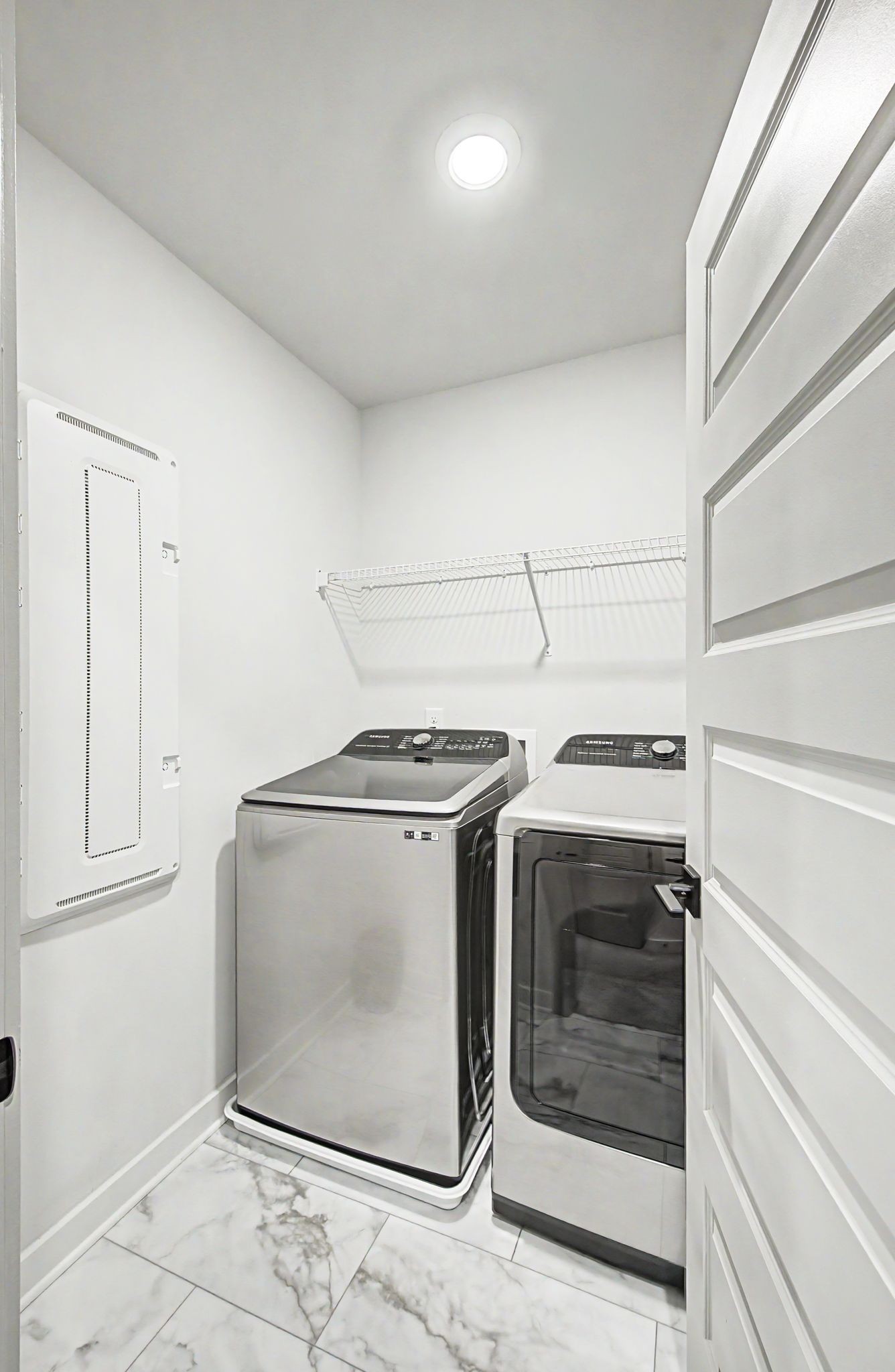 1039 Ewell Farm Drive Spring Hill, TN 37174 - Photo 35 of 70 a utility room with dryer and washer