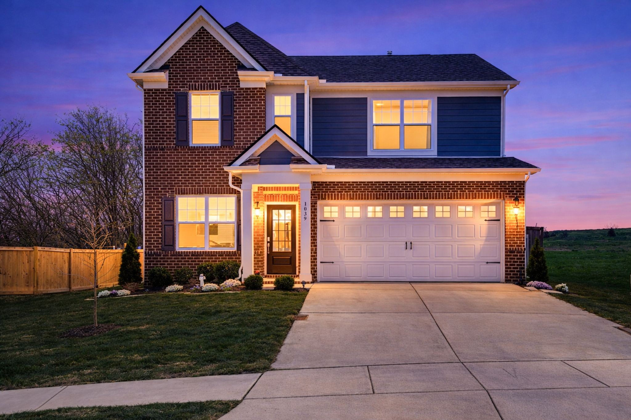 1039 Ewell Farm Drive Spring Hill, TN 37174 - Photo 5 of 70 a front view of a house with a yard