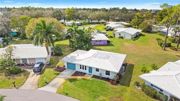 a view of a house with a ocean view