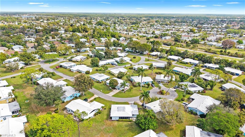 54 Hilo Court, Unit 54 Naples, FL 34112 - Photo 4 of 42 an aerial view of a residential houses with city view