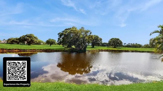 a view of a lake with a big yard