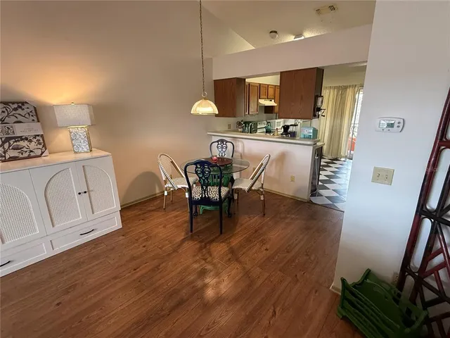 a black and white checkered floor with a black white checkered floor