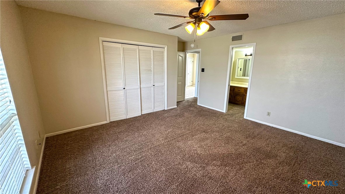 1500 Halbert Street Killeen, TX 76541 - Photo 19 of 36 wooden floor in an empty room with a window