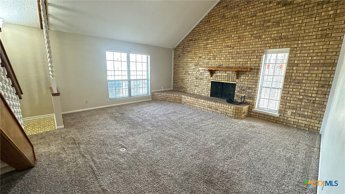 1500 Halbert Street Killeen, TX 76541 - Photo 9 of 36 a view of an empty room with a fireplace