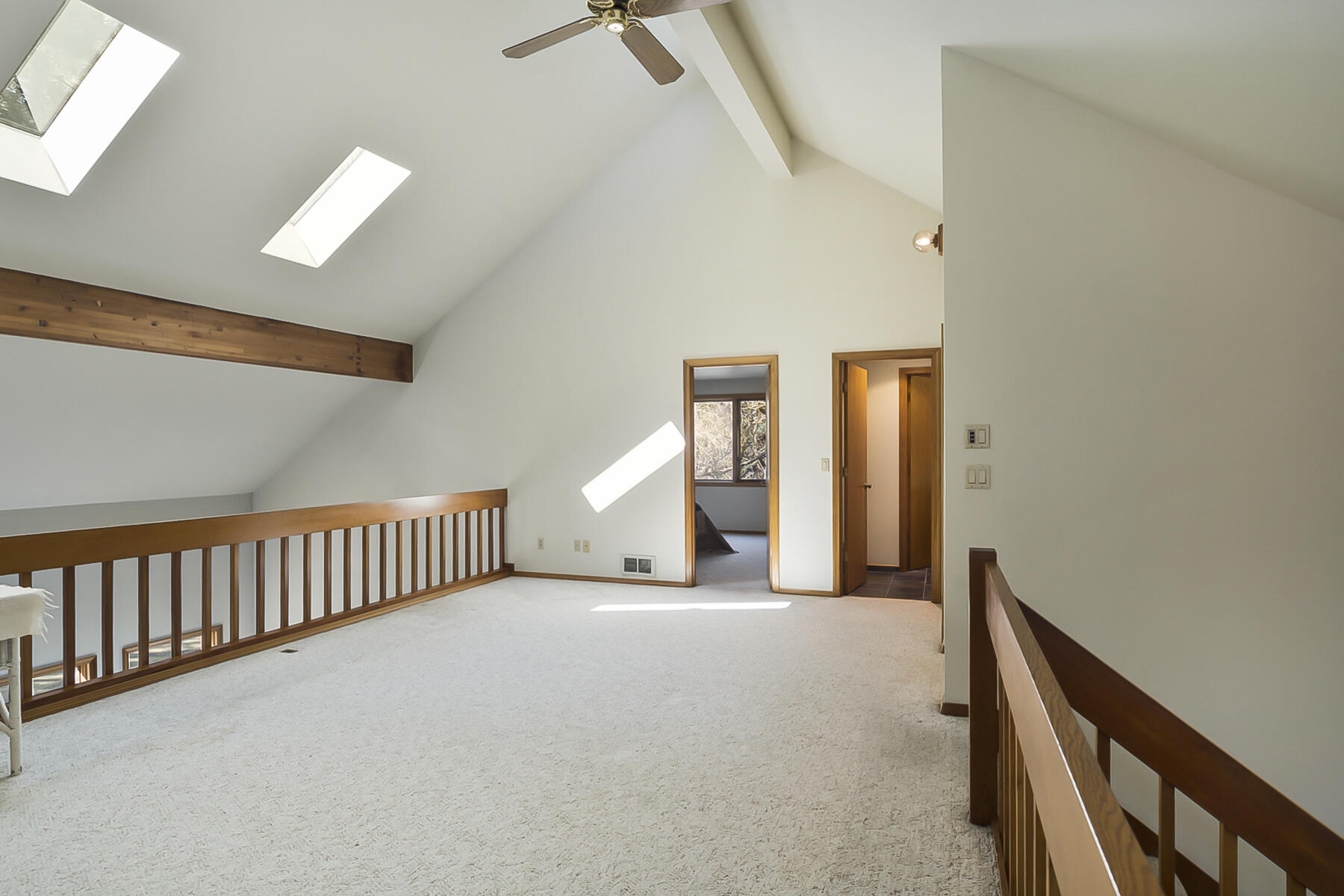 60195 East Ridgeview Drive Bend, OR 97702 - Photo 31 of 59 a view of a hallway with entryway and stairs