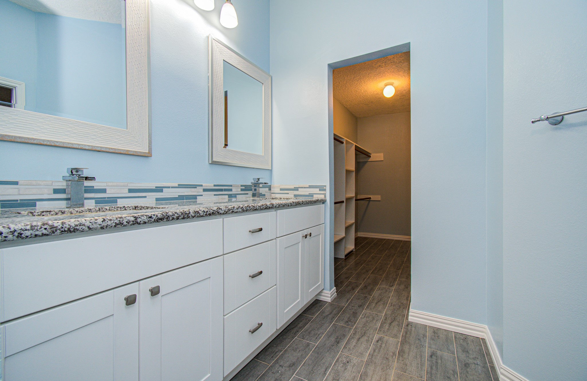 10546 Rippling Fields Drive Houston, TX 77064 - Photo 19 of 31 Updated Primary bath with beautiful cabinetry.