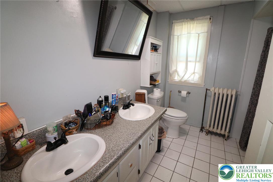 441 Franklin Avenue Palmerton, PA 18071 - Photo 14 of 31 a bathroom with a sink and a mirror